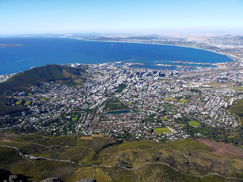 View from the Table Mountain plateau (1086 m) looking north towards the port metropolis of Cape Town on November 4, 2025.